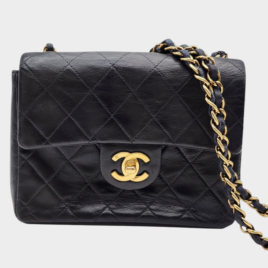 CHANEL Mini Matelassé Lambskin Turnlock Coco Mark Black with Seal, Serial Number 5