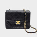 CHANEL Mini Matelassé Lambskin Turnlock Coco Mark Black with Seal, Serial Number 5